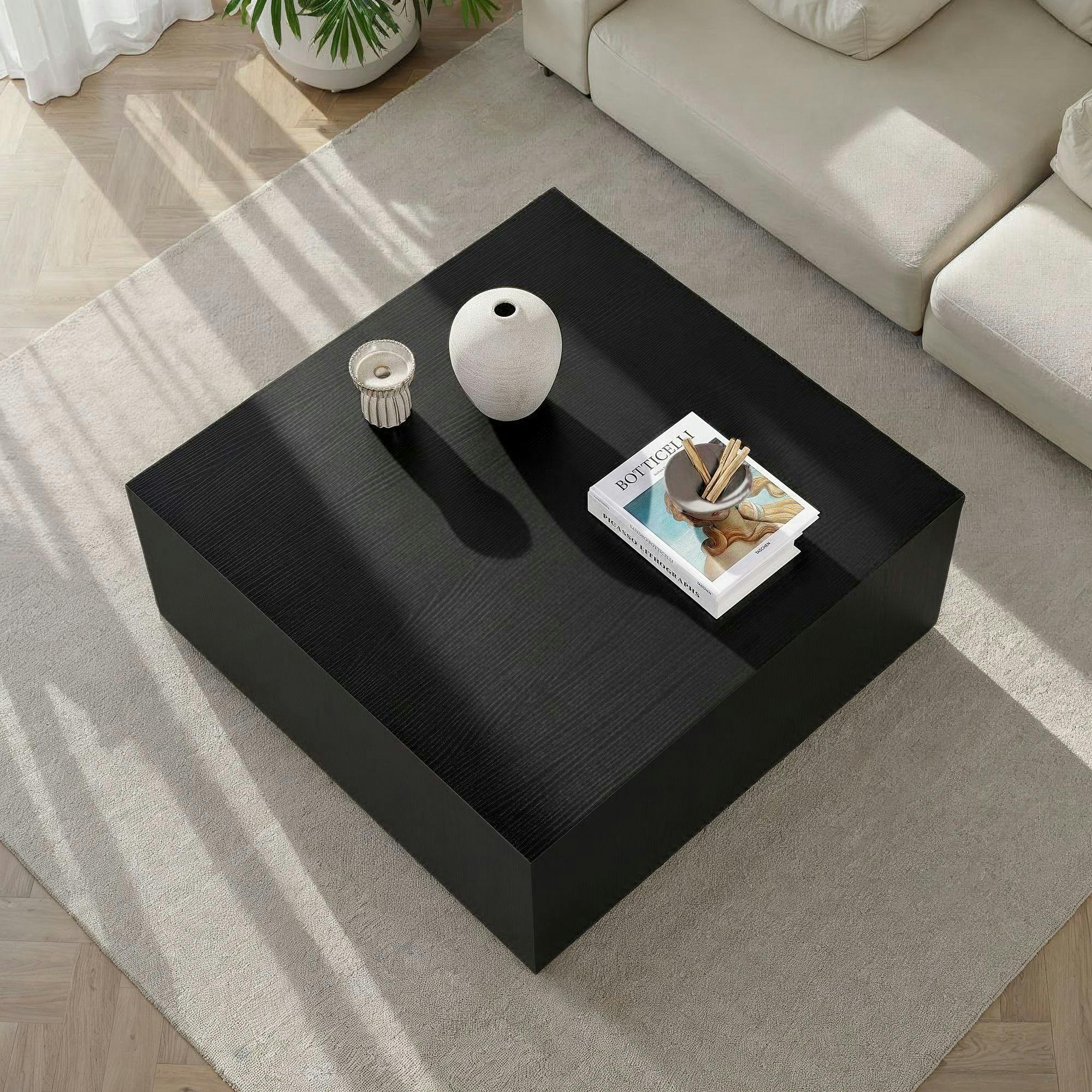 Table basse noire carrée roulettes invisibles MARFA
