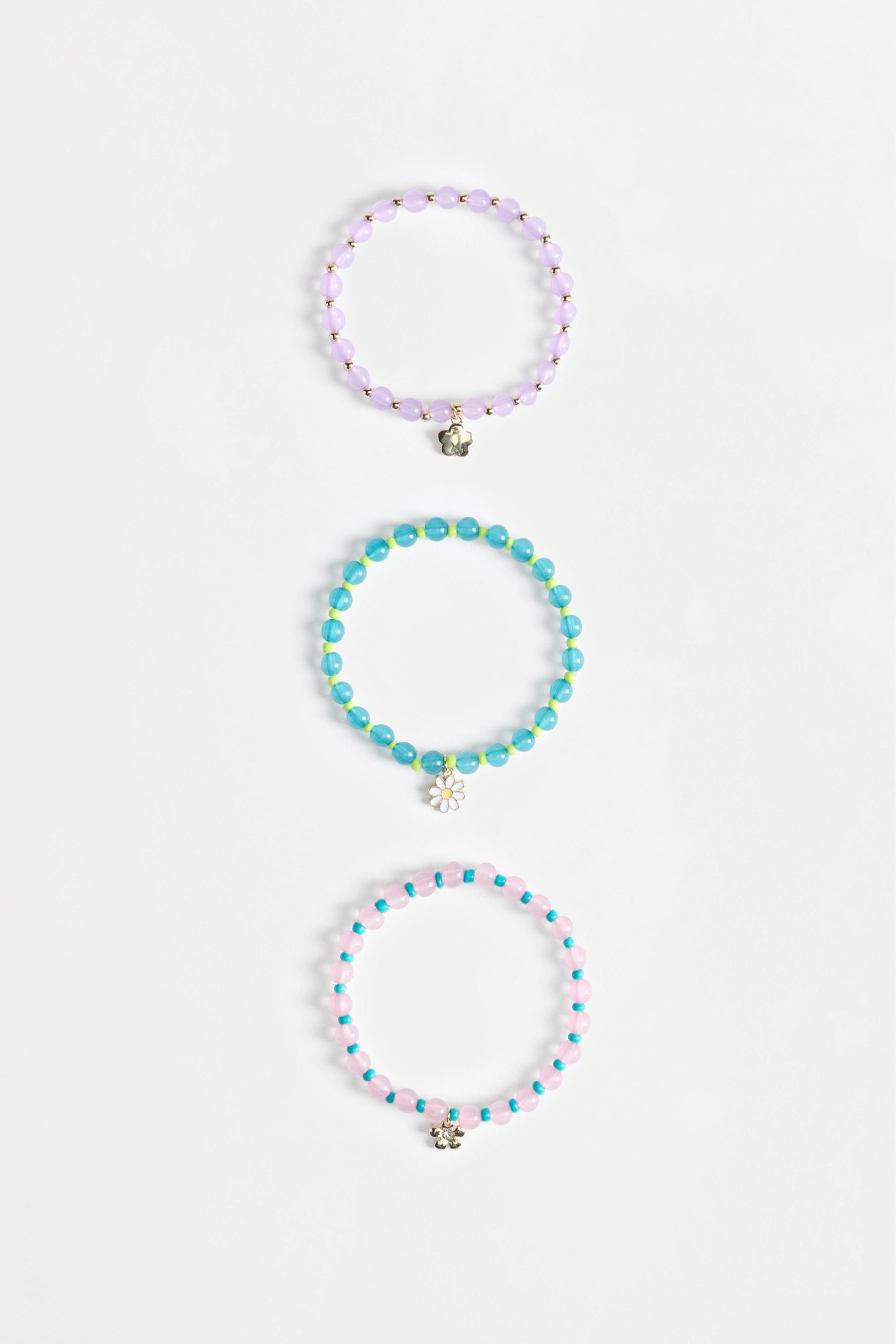 Pulsera colgantes flores (Pack 3)