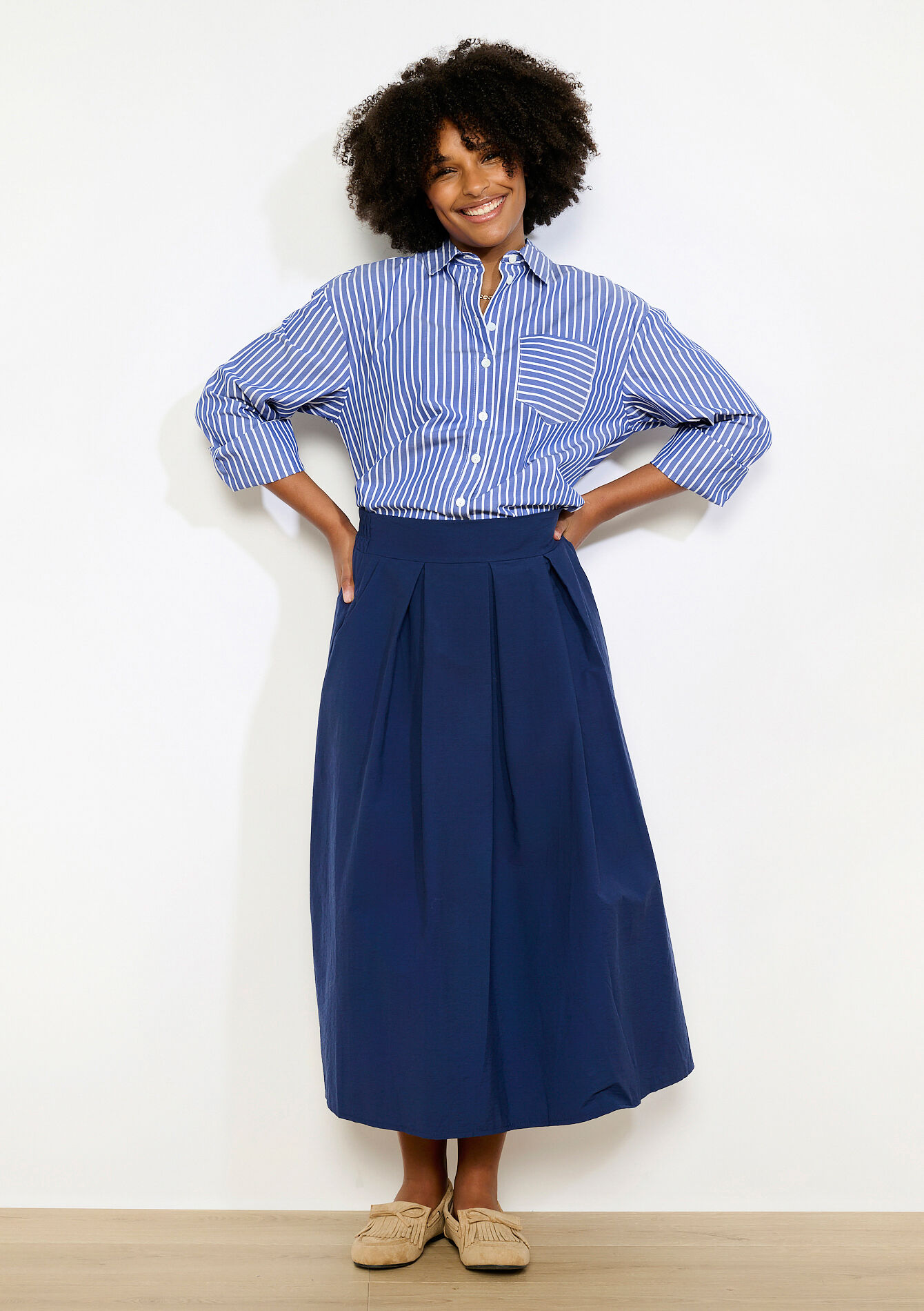 Middellange geplooide rok