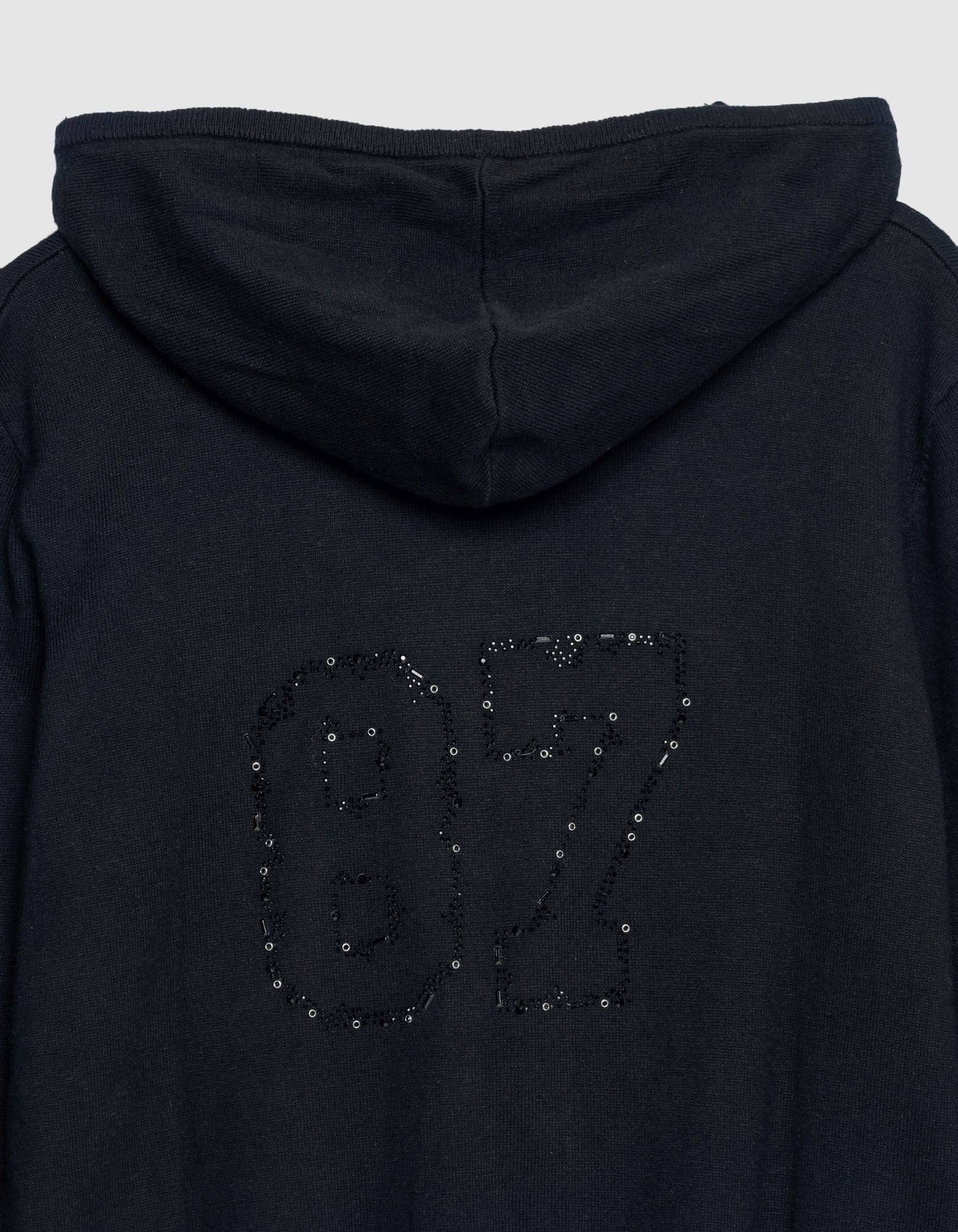 Cardigan capuche noir tricot chiffres strass dos Femme