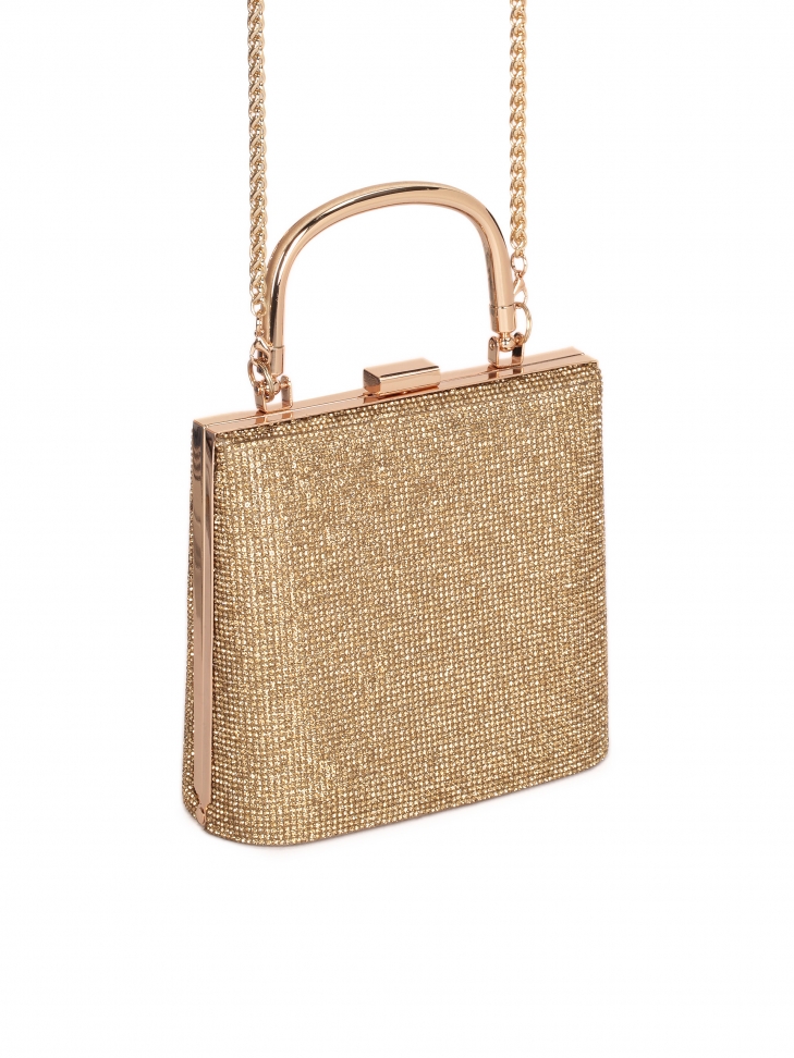 Shiny evening bag with a handle