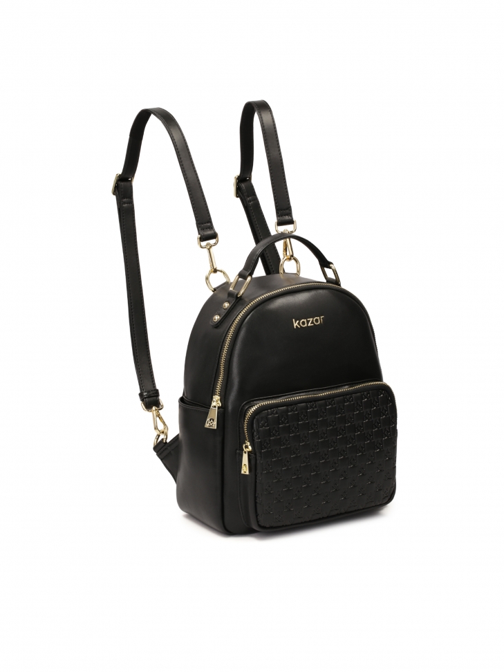 Black leather backpack decorated with embossed pattern