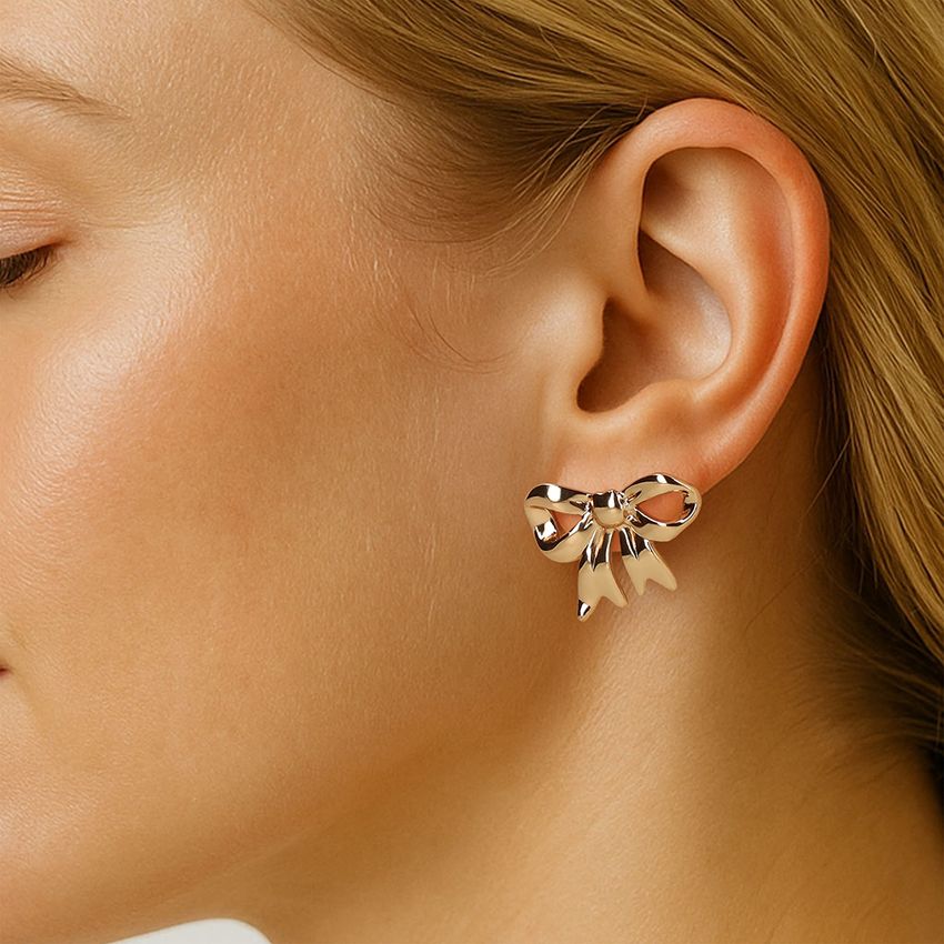 Manfield Gouden strikjes oorbellen