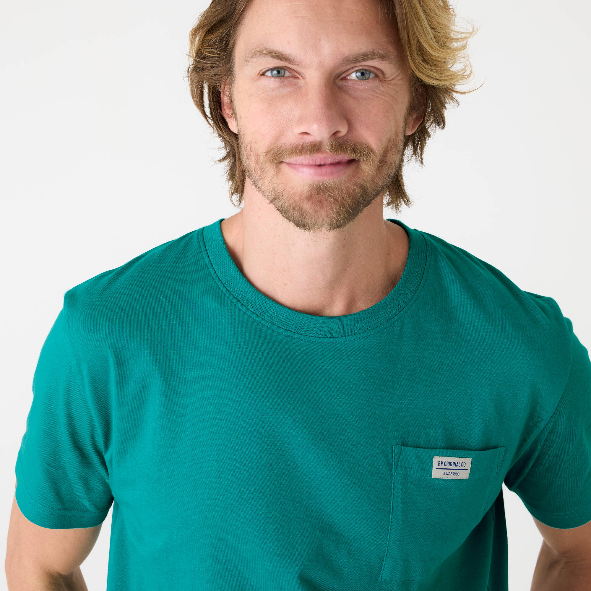 T-shirt poche uni col rond manches courtes