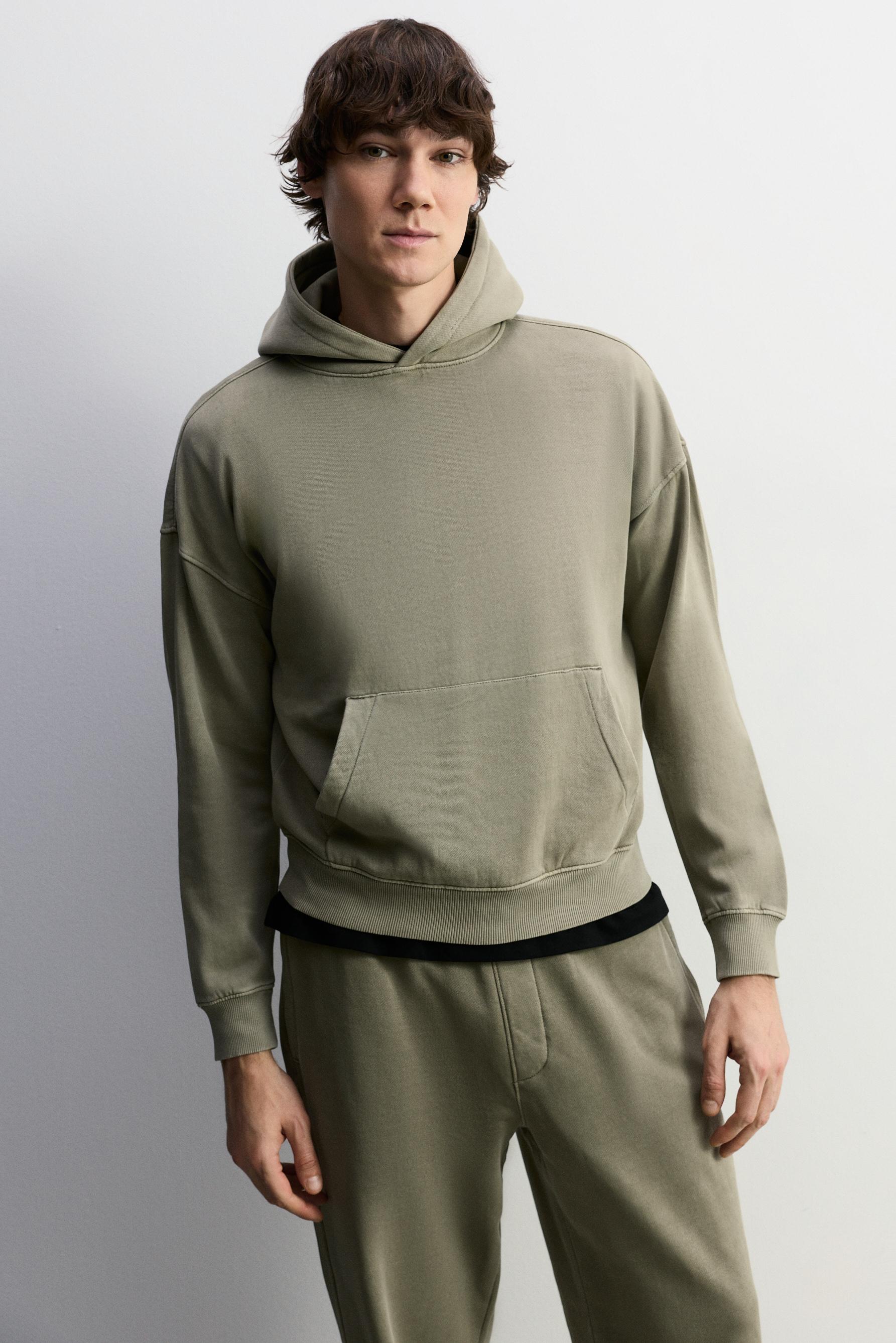 Sudadera efecto lavado capucha