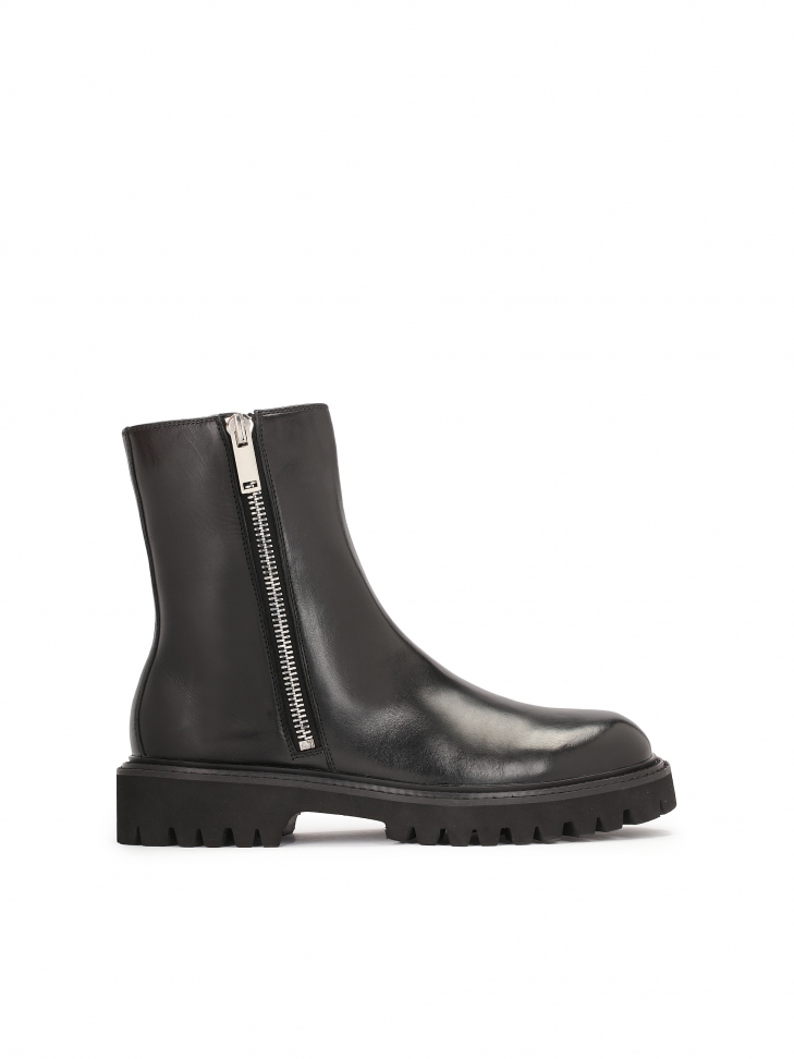 Men's leather flat ankle boots on a thick sole with a thread