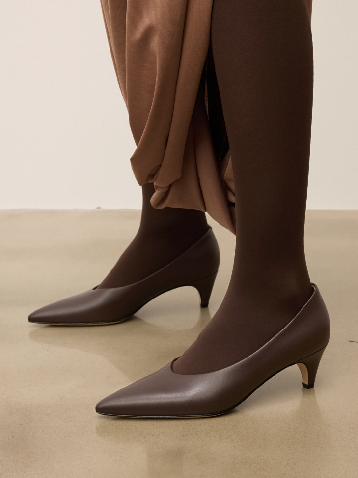 Dark brown pumps with extended nose