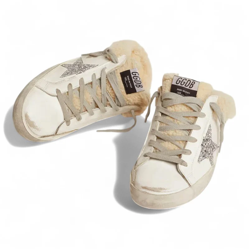 The Super-Star Sabot in white leather with shearling lining