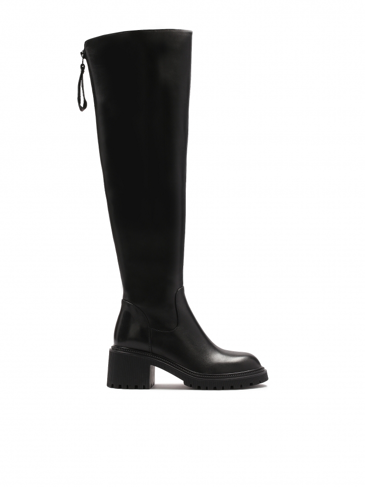 Leather black boots with an upper below the knee