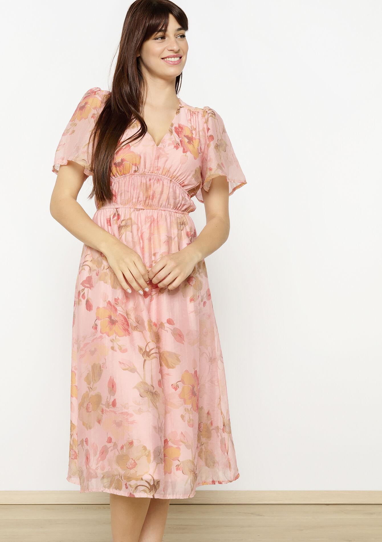 Bloemenjurk met smokwerk