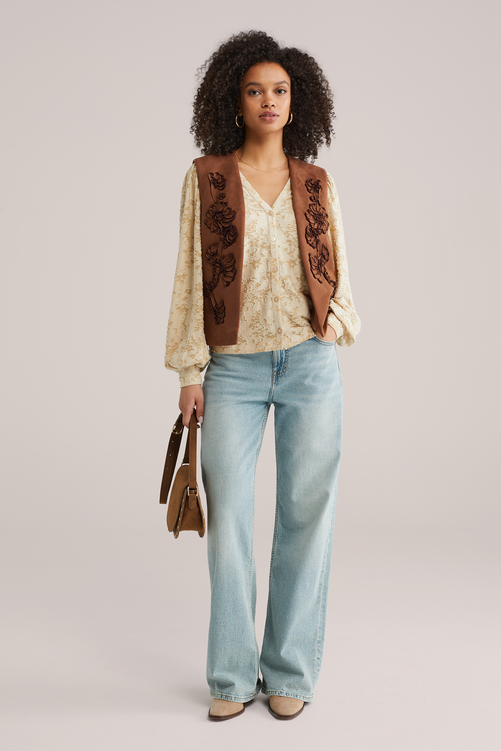 Dames regular fit gilet met su&egrave;de-look