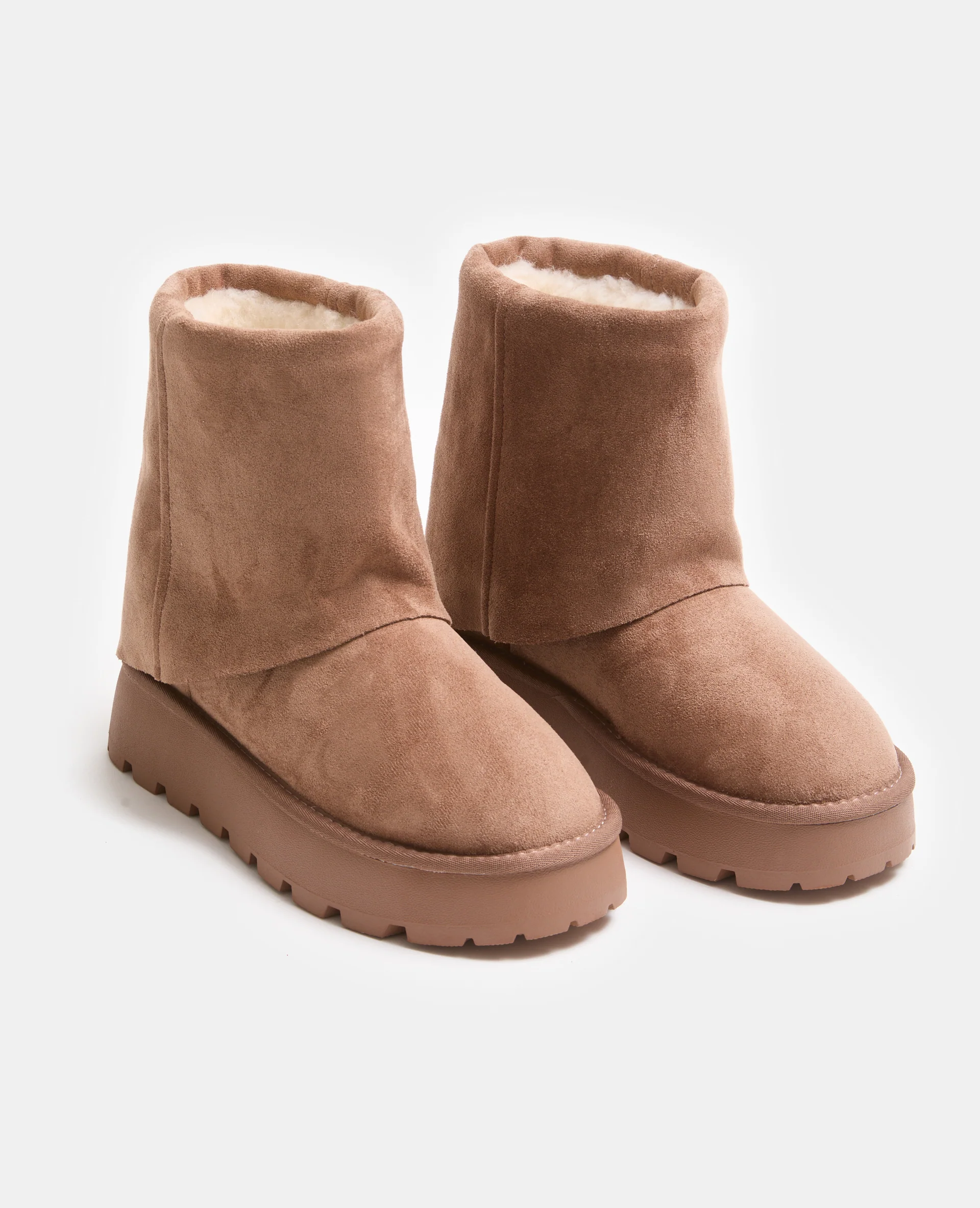 Boots fourrées avec semelles compensées