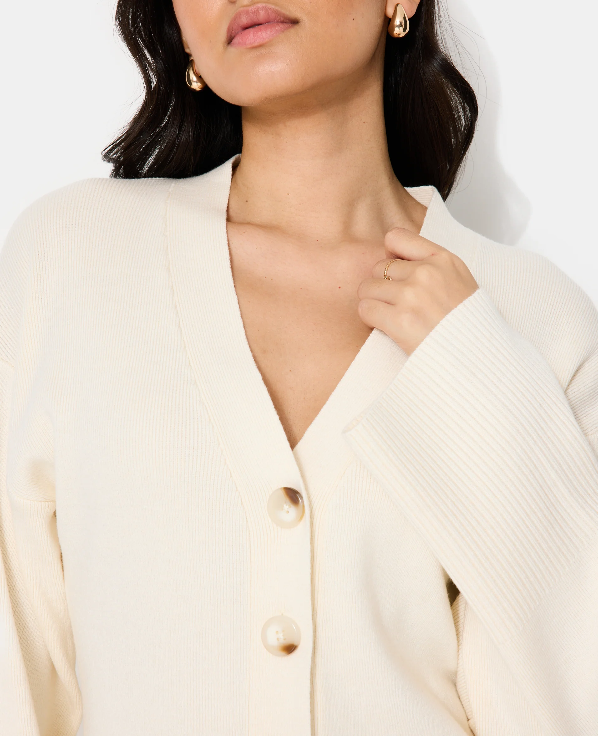 Gilet long et cintré avec poches