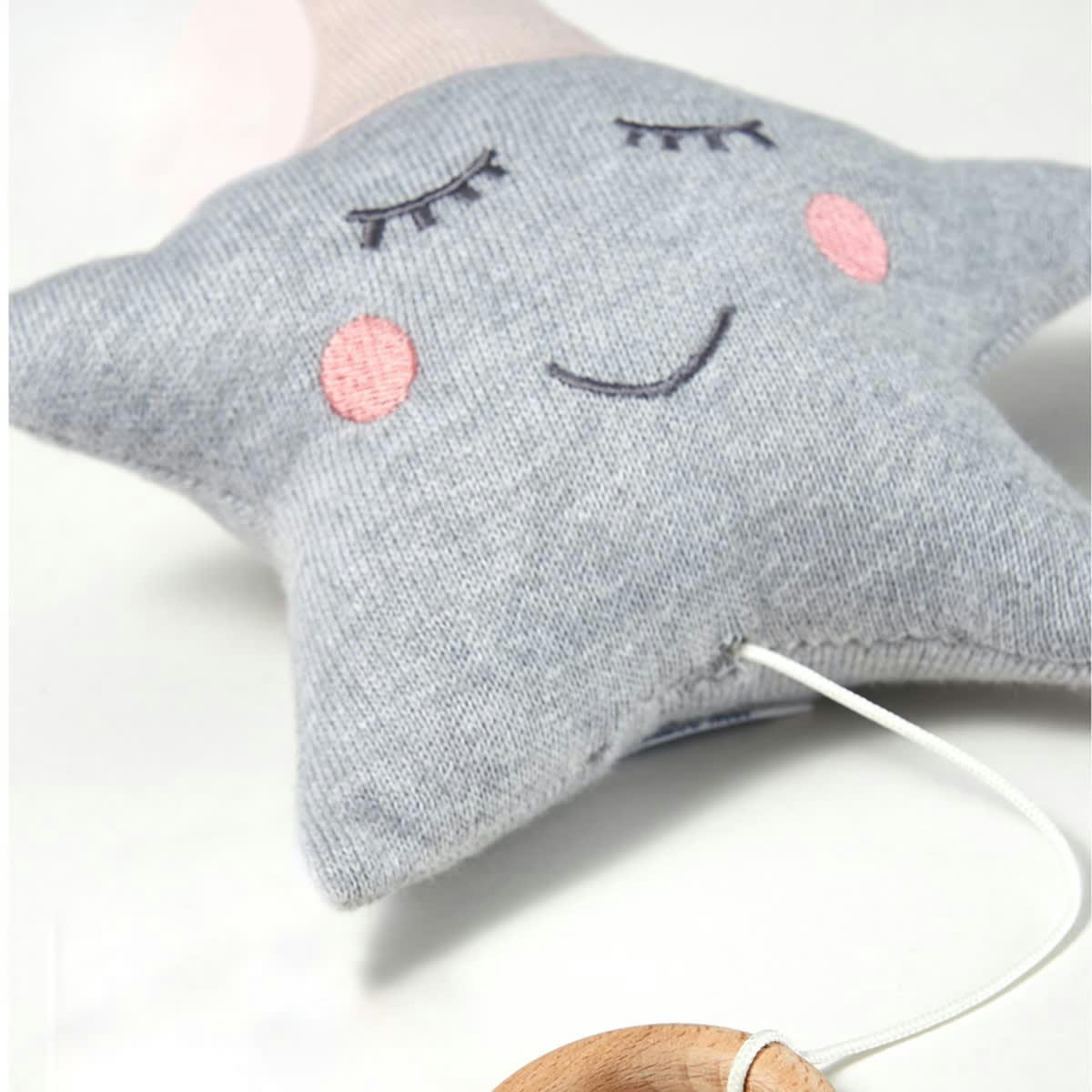 - Peluche musicale bébé en coton tricoté étoile rose 22x22 cm