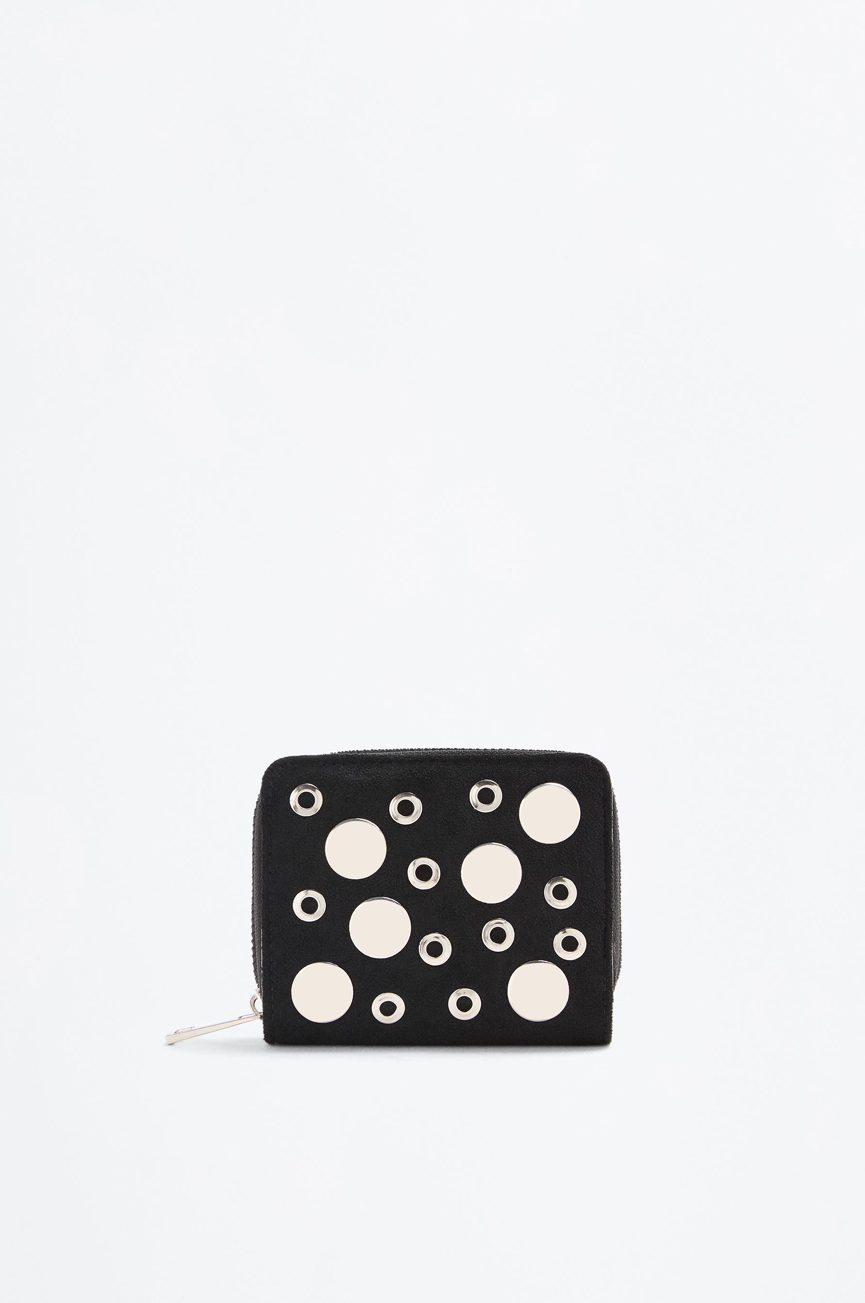 Cartera tachas