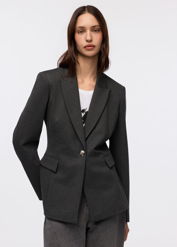 Blazer con spilla gioiello