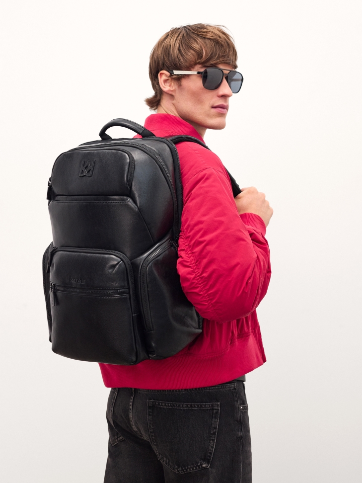Leather backpack with laptop compartment