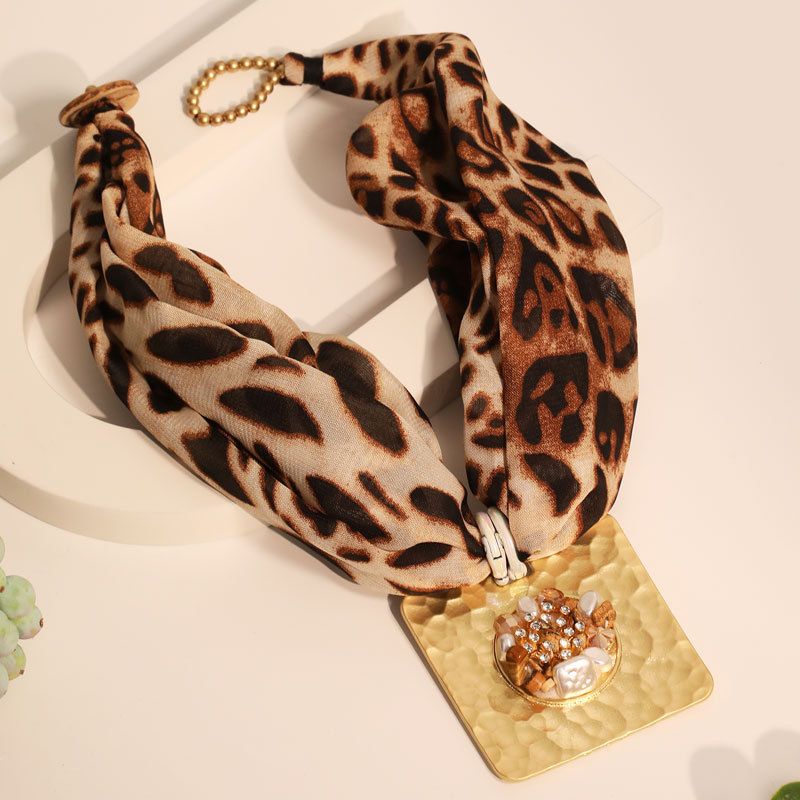 PEACH ACCESSORIES Leopard Print Necklace with Bold Gold Medallion