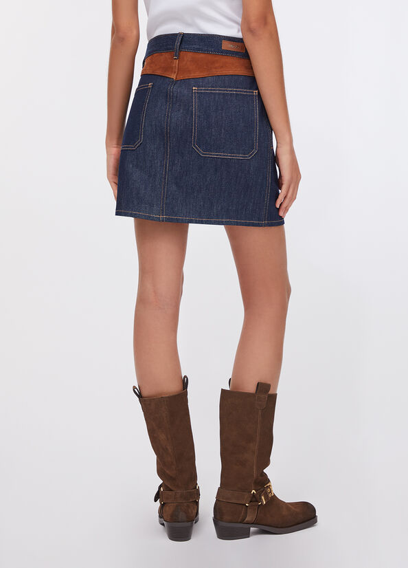Minigonna in denim con inserto in suede