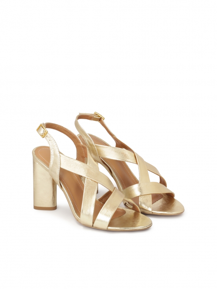 Gold sandals with wide straps