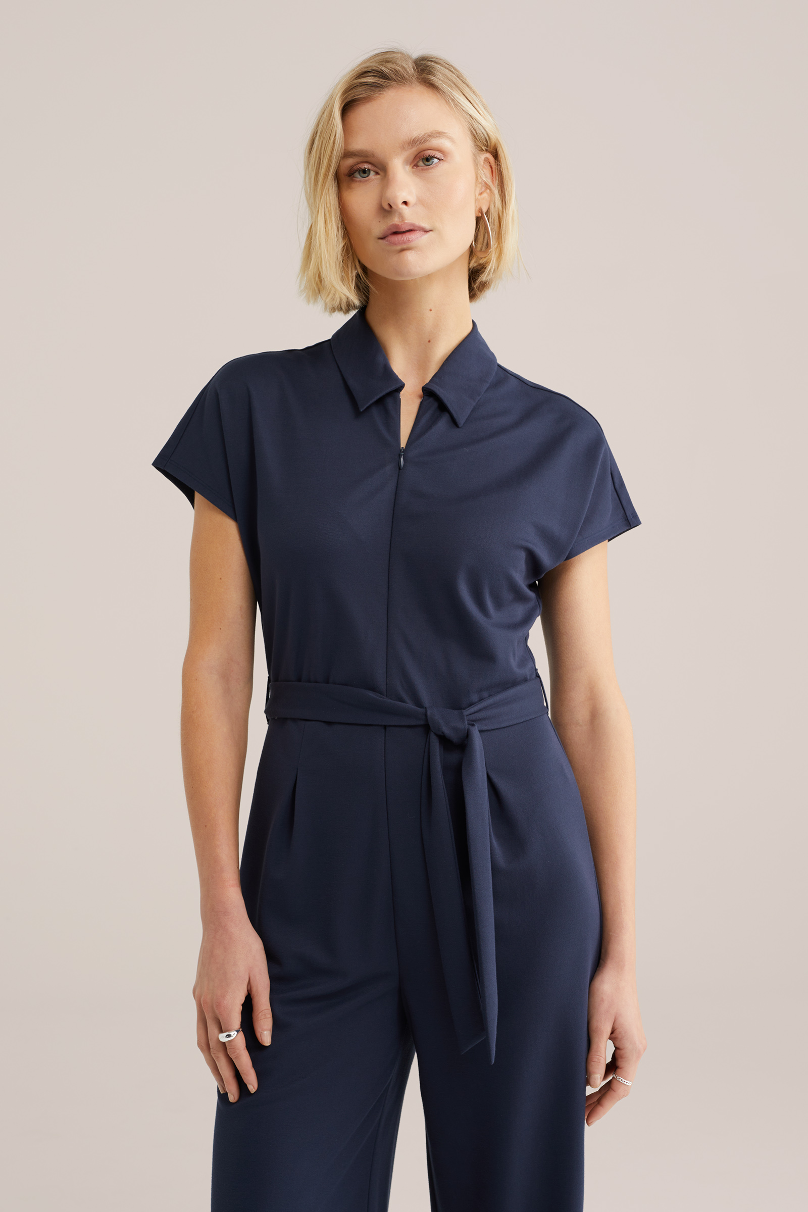 Dames jersey jumpsuit met ritskraag