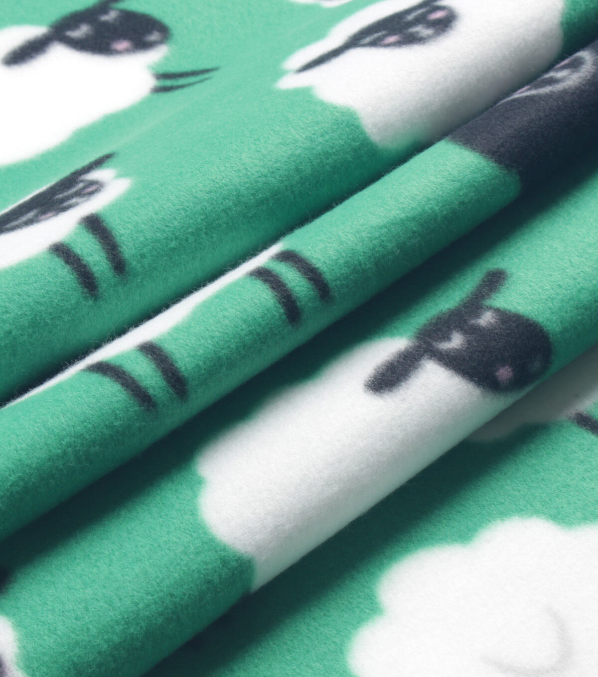 Happy Sheep on Green Blizzard Fleece Fabric