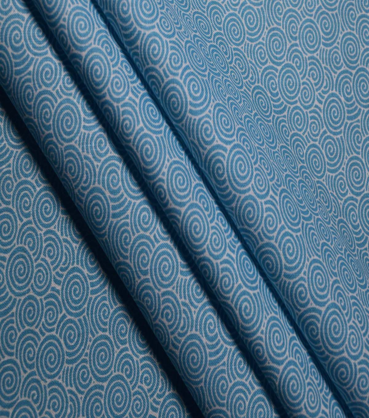 Swirls on Scuba Blue Cotton Fabric by Quilter's Showcase