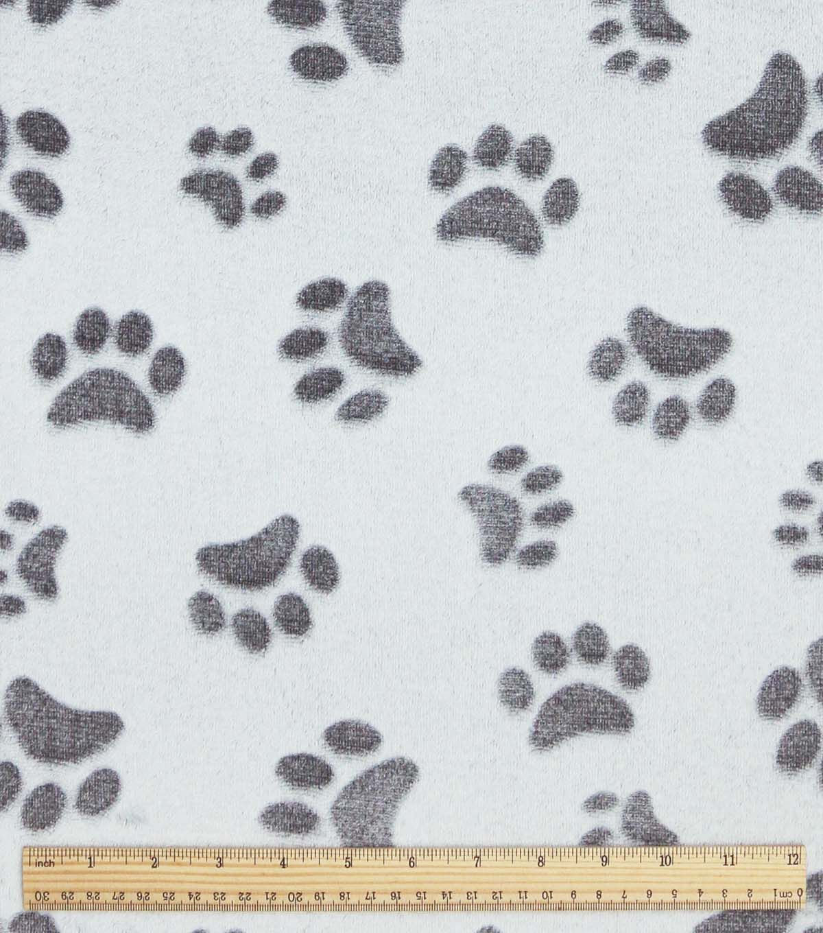 Gray Embossed Paw Prints Sew Lush Fleece Fabric