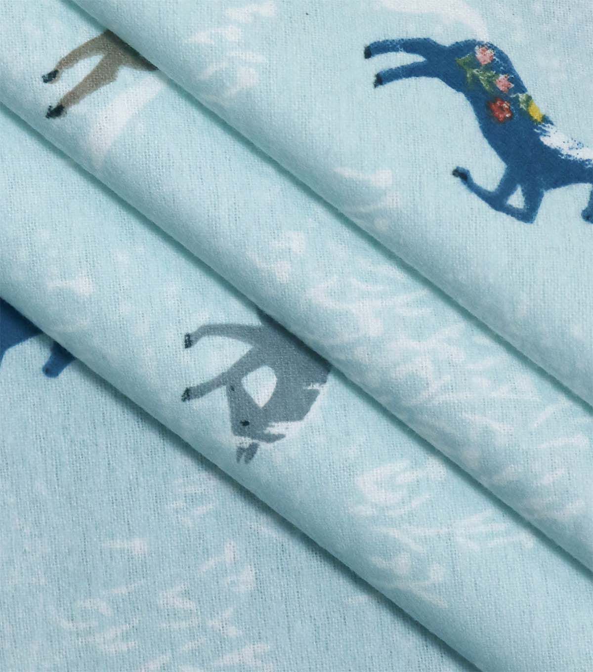 Horses on Blue Super Snuggle Flannel Fabric