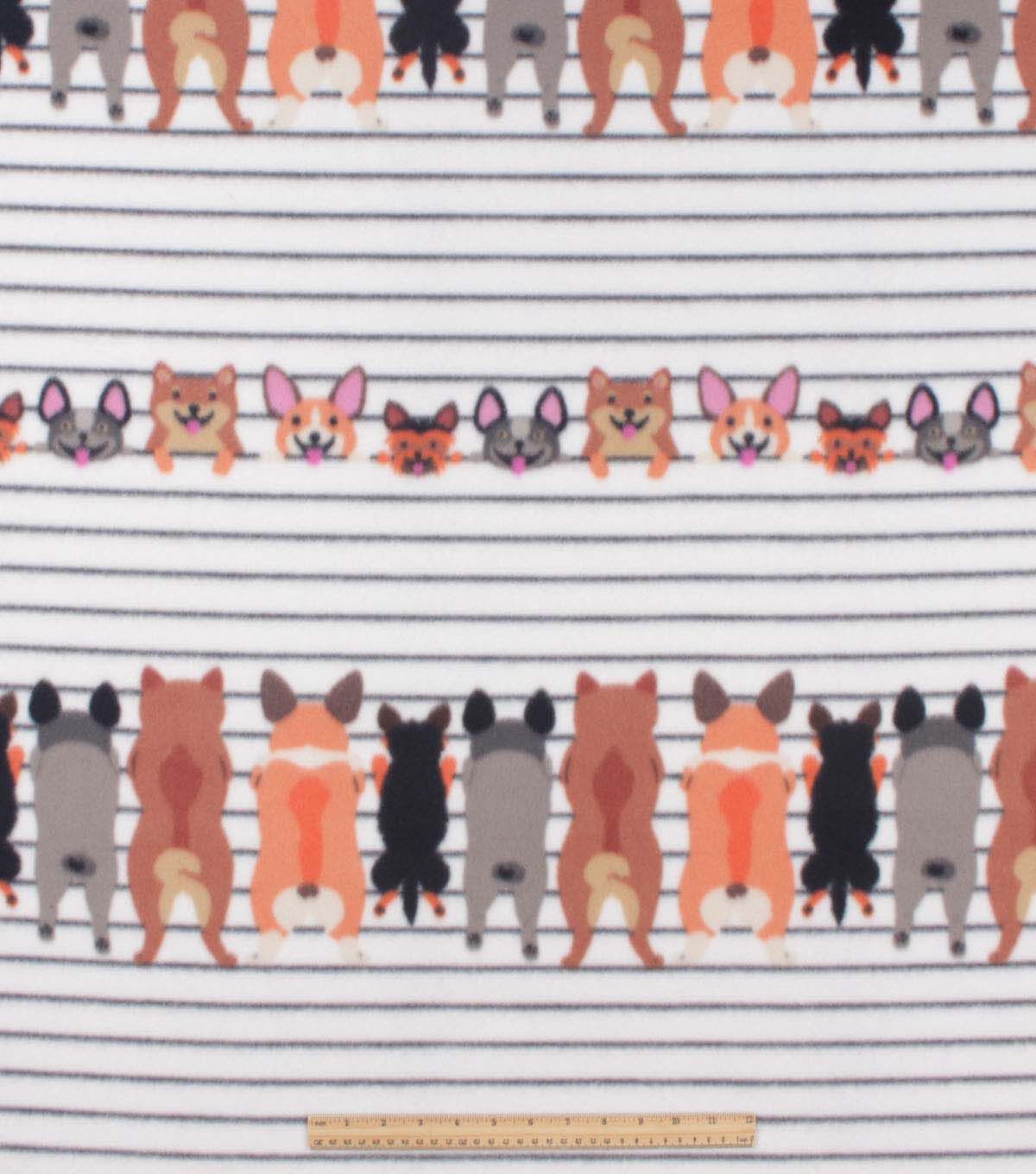 Doggies on White Fence Blizzard Fleece Fabric