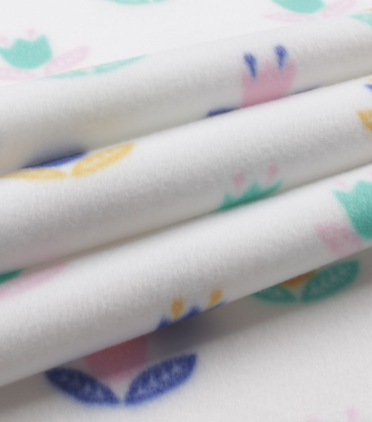 Linear Tulips on White Blizzard Fleece Fabric