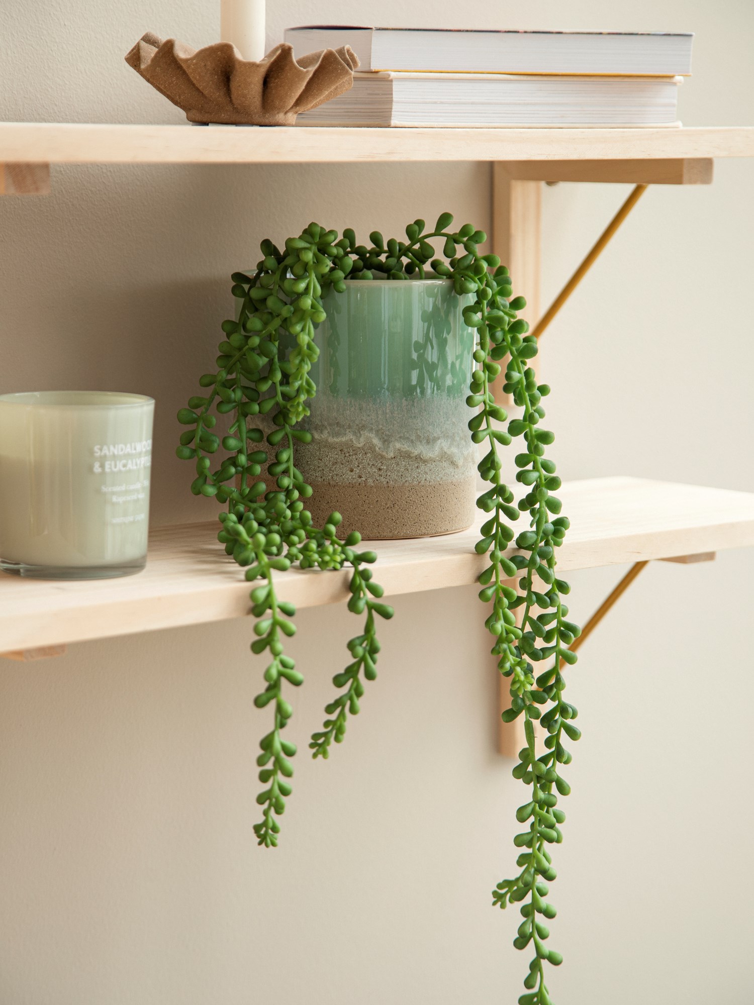 Artificial hanging plant in pot