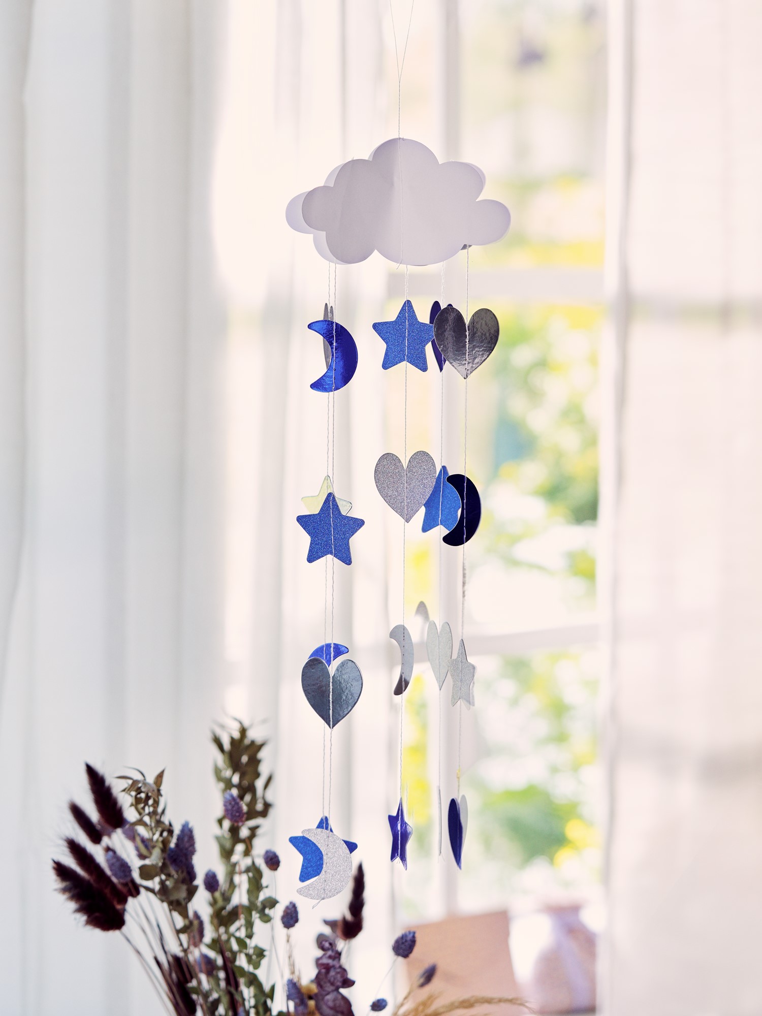 Paper cloud with raindrops