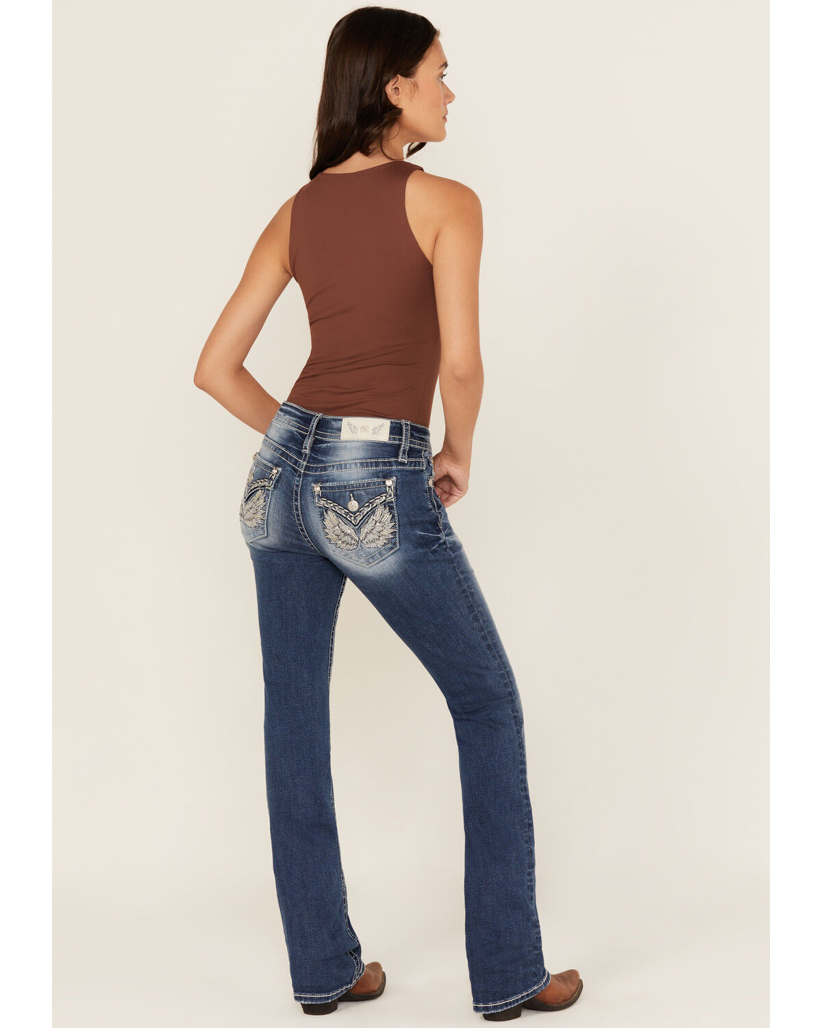 Miss Me Women's Medium Wash Mid Rise Winged Pocket Bootcut Stretch Denim Jeans