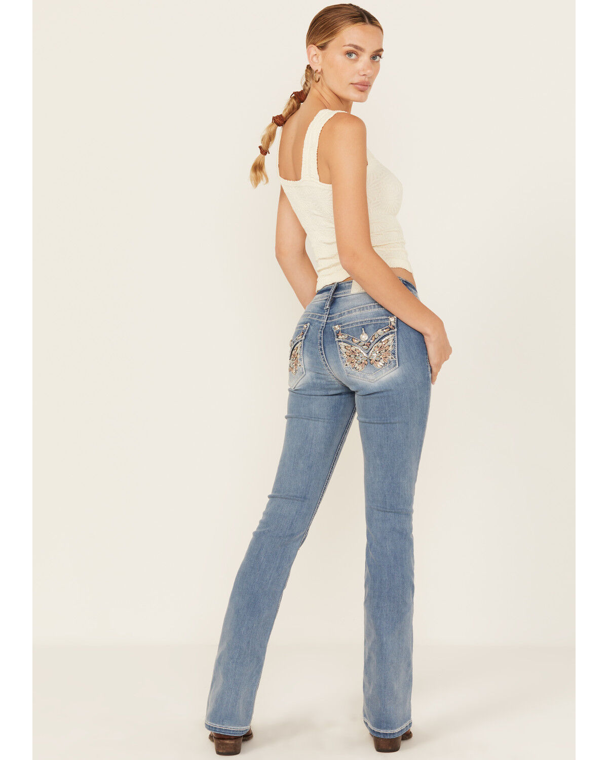 Miss Me Women's Light Wash Mid Rise Butterfly Pocket Bootcut Stretch Denim Jeans