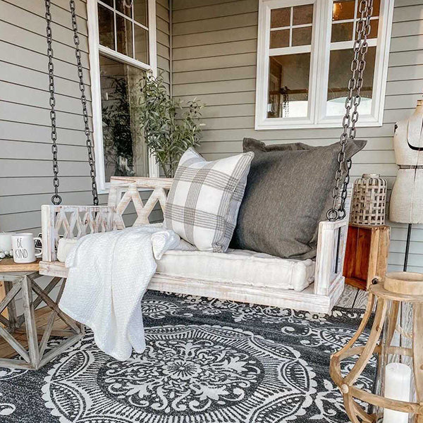 Whitewashed Cushioned Porch Swing