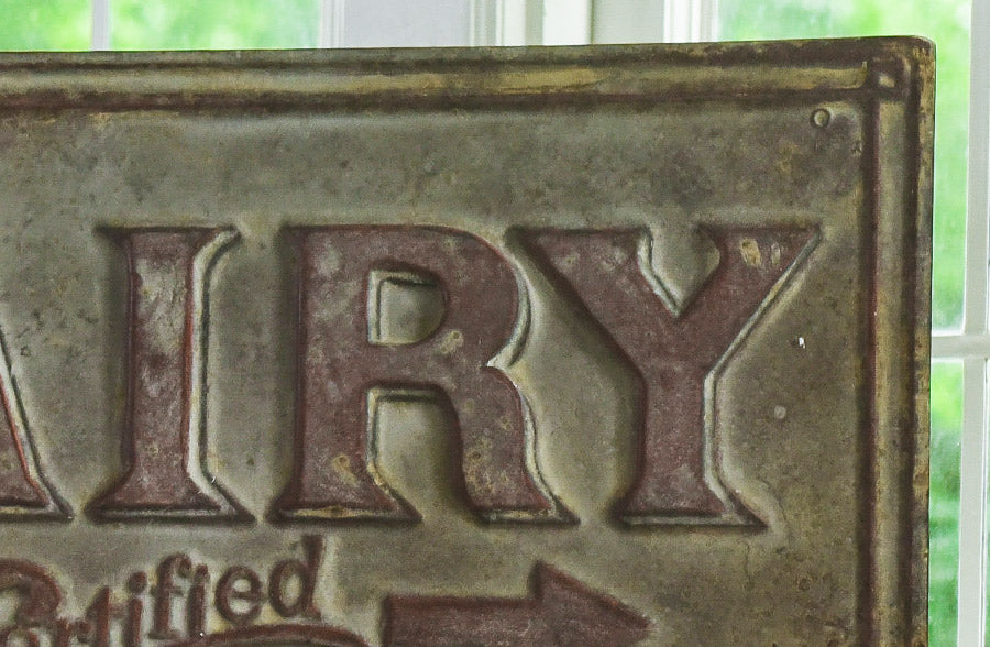 Rusted Patina Embossed Dairy Sign