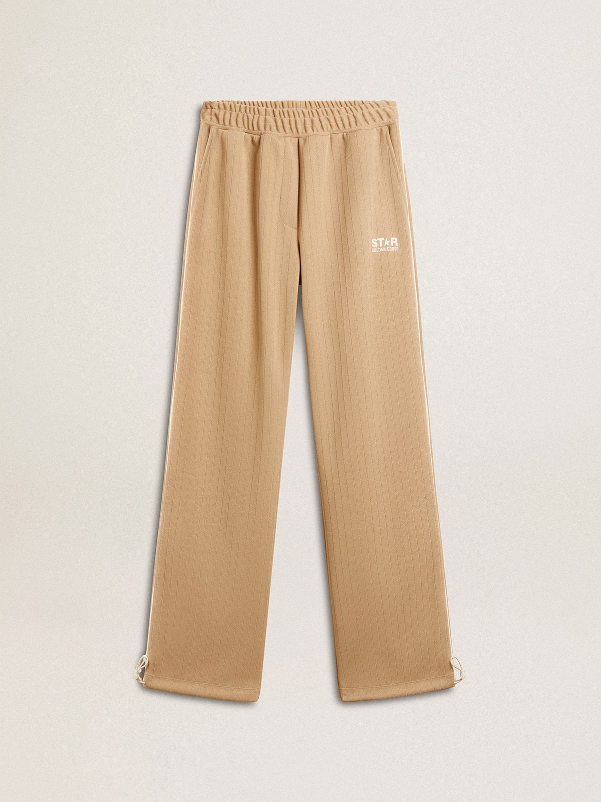 Women's light beige joggers with white logo