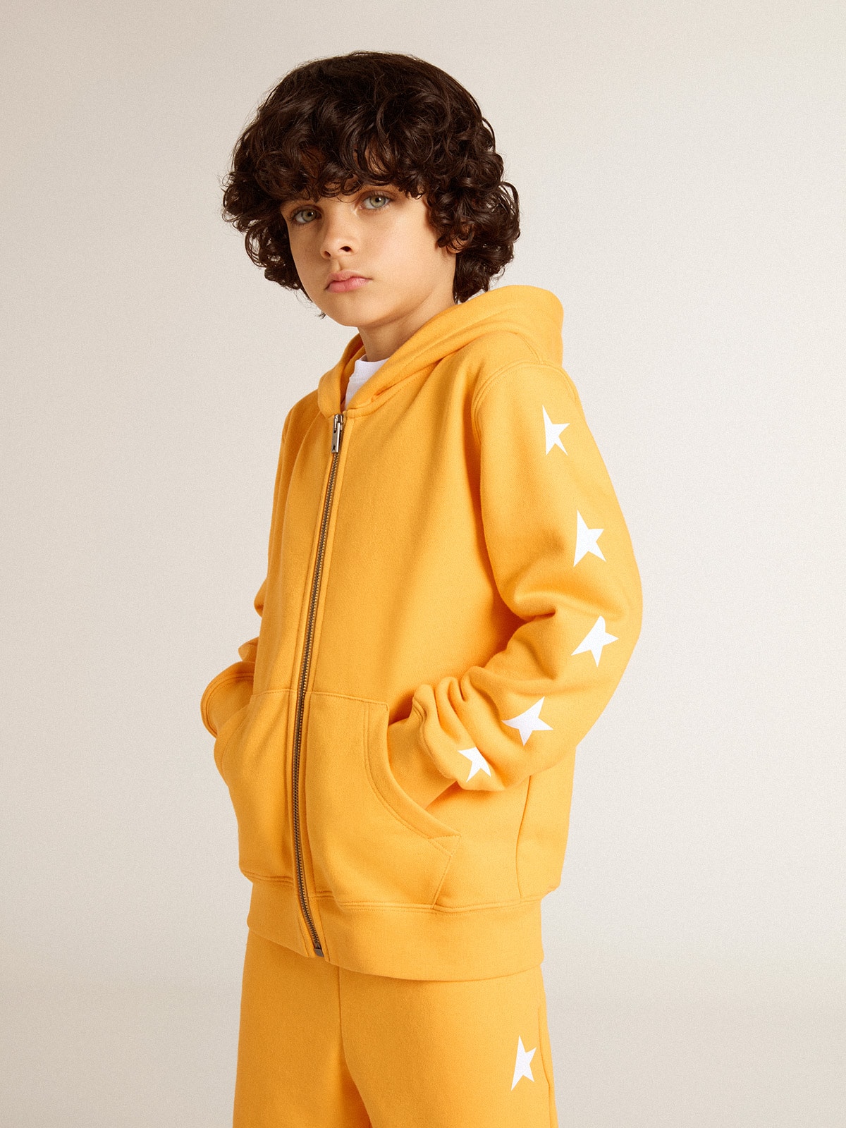 Boys' orange sweatshirt with zip fastening