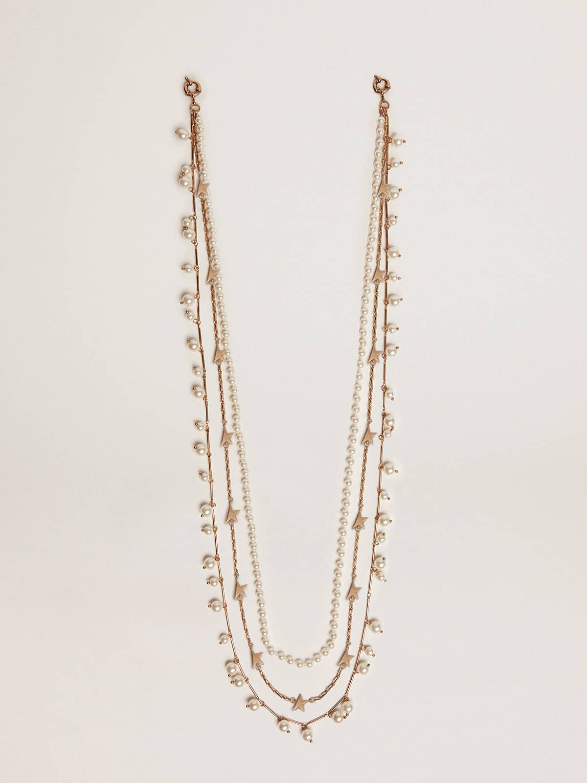 Women's necklace with three antique gold-colored heritage chains