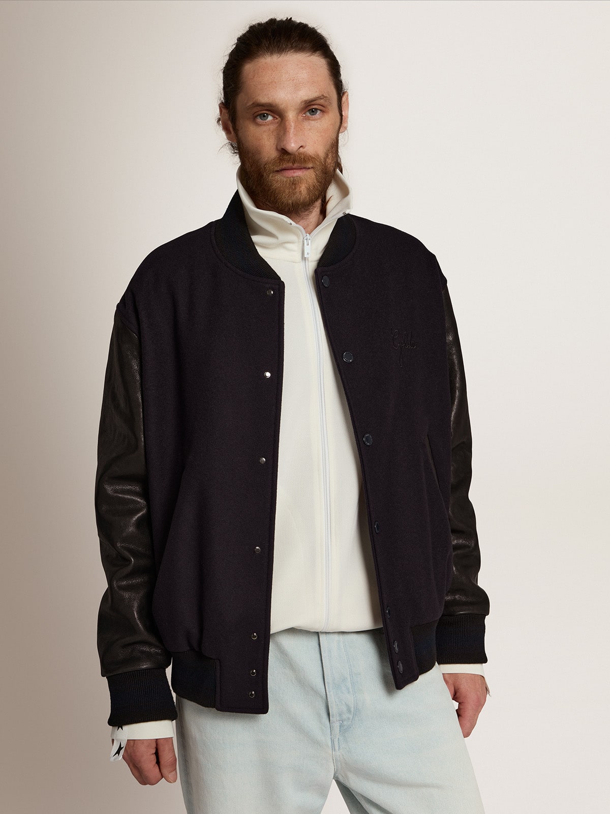Men's bomber jacket in dark blue wool with leather sleeves