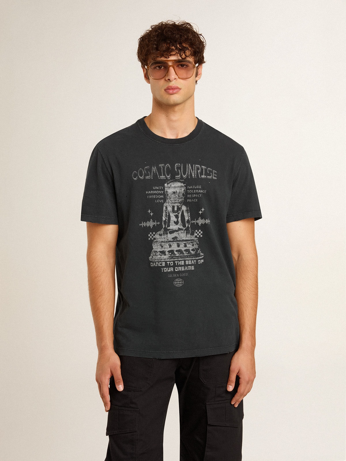 Men's worn-black cotton T-shirt with print on the front
