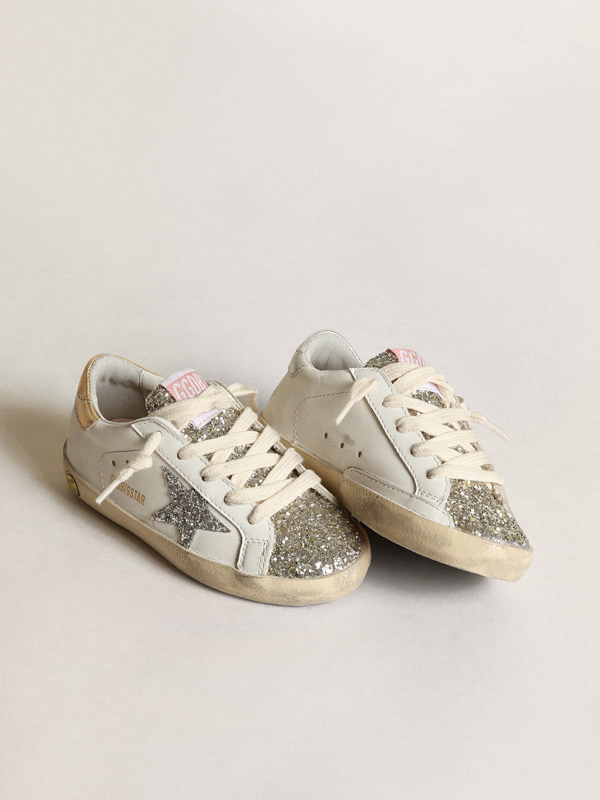 Young Super-Star with silver glitter star and platinum tongue