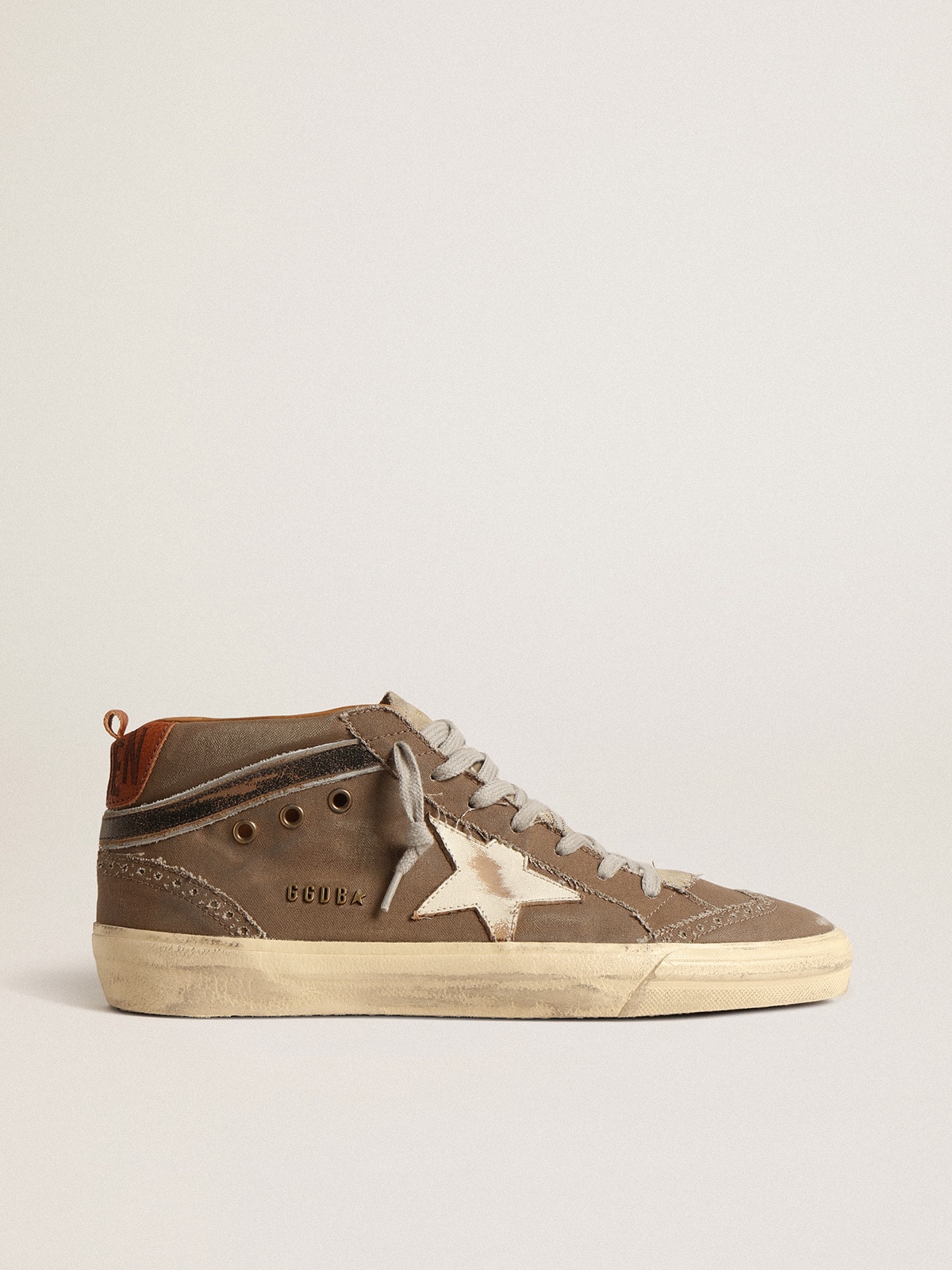 Mid Star in green canvas with leather star and black flash