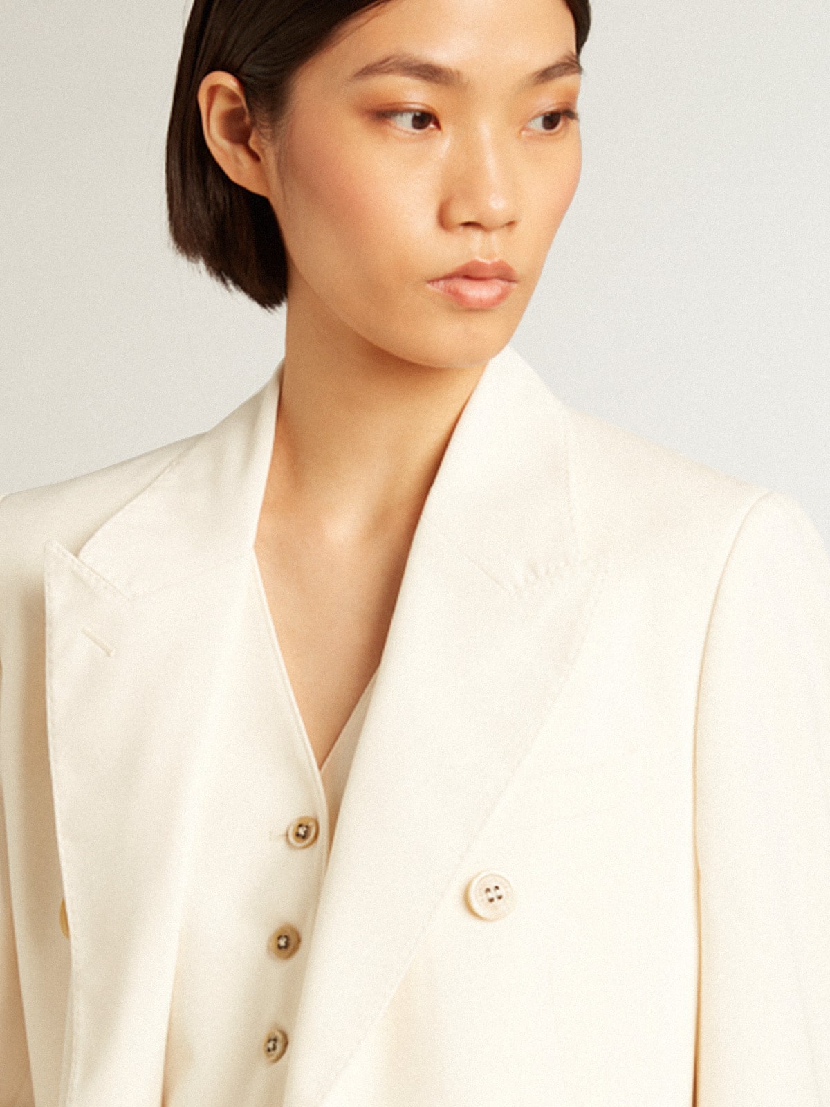 Women's aged white double-breasted blazer