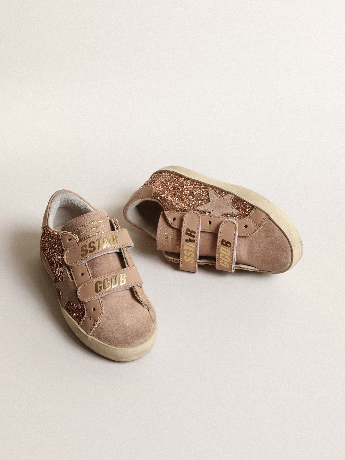 Old School Junior in peach-pink glitter with pink suede star
