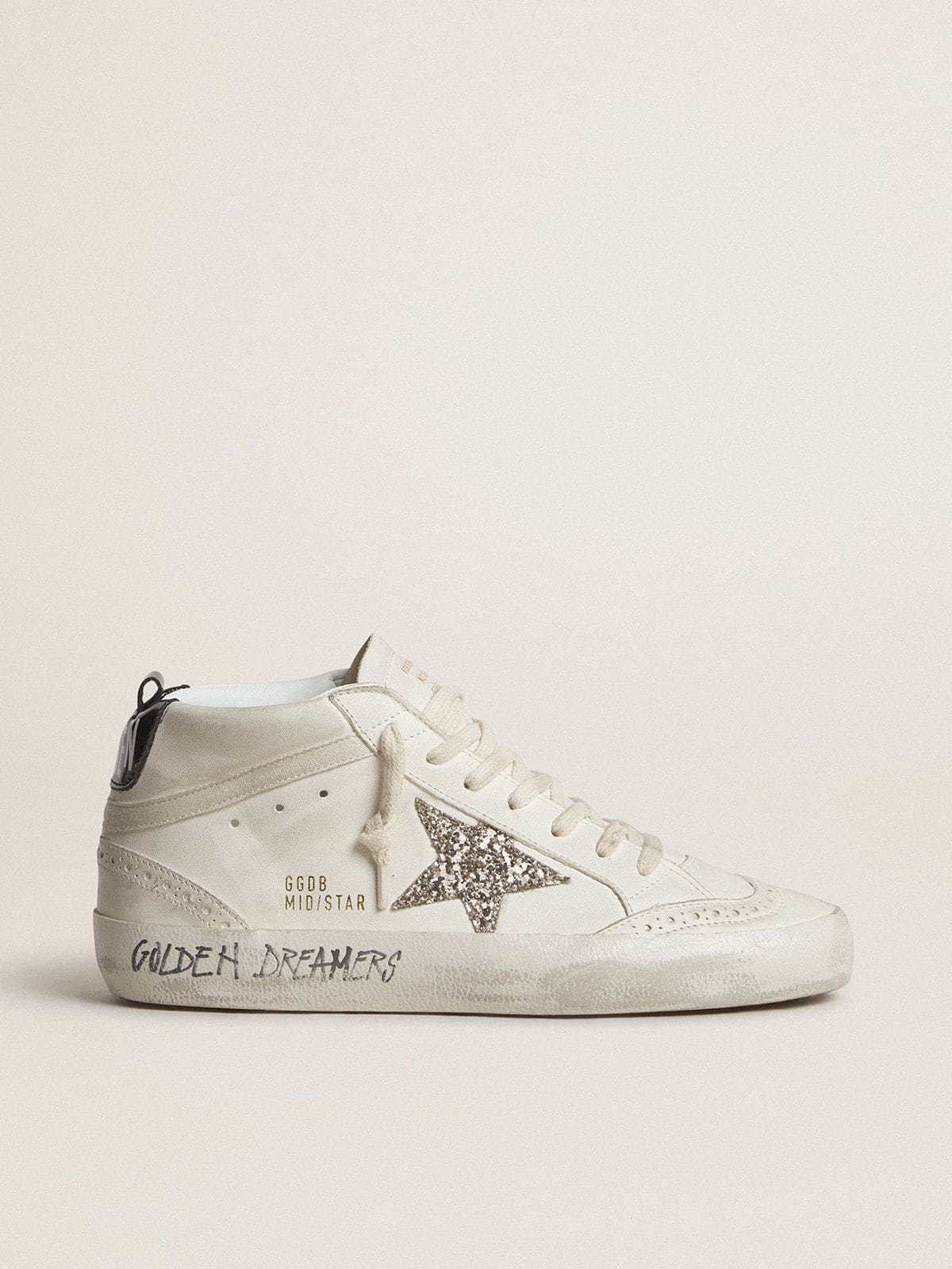 Mid Star with silver glitter star and black laminated heel tab