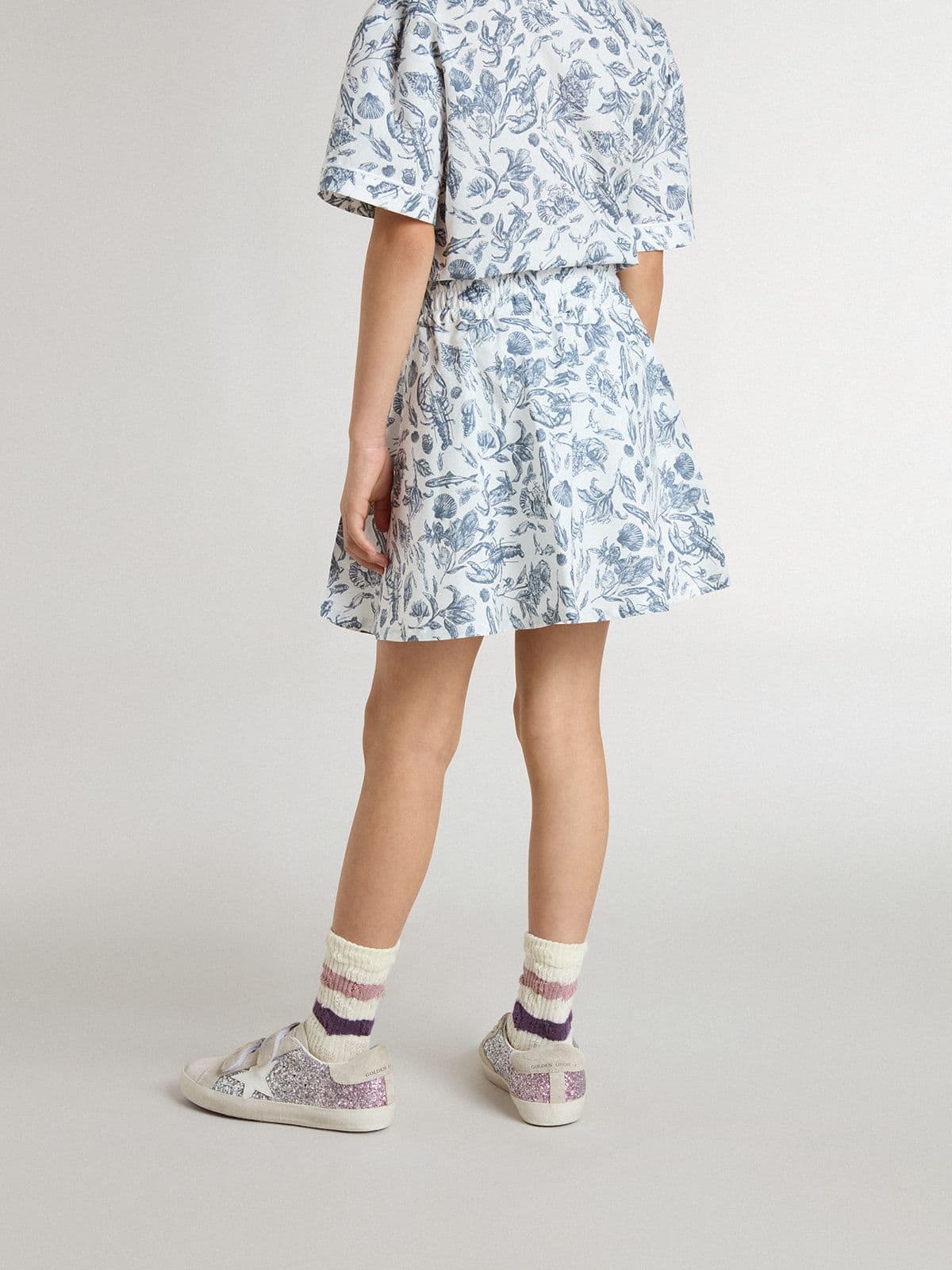 Girls' white skirt with blue print