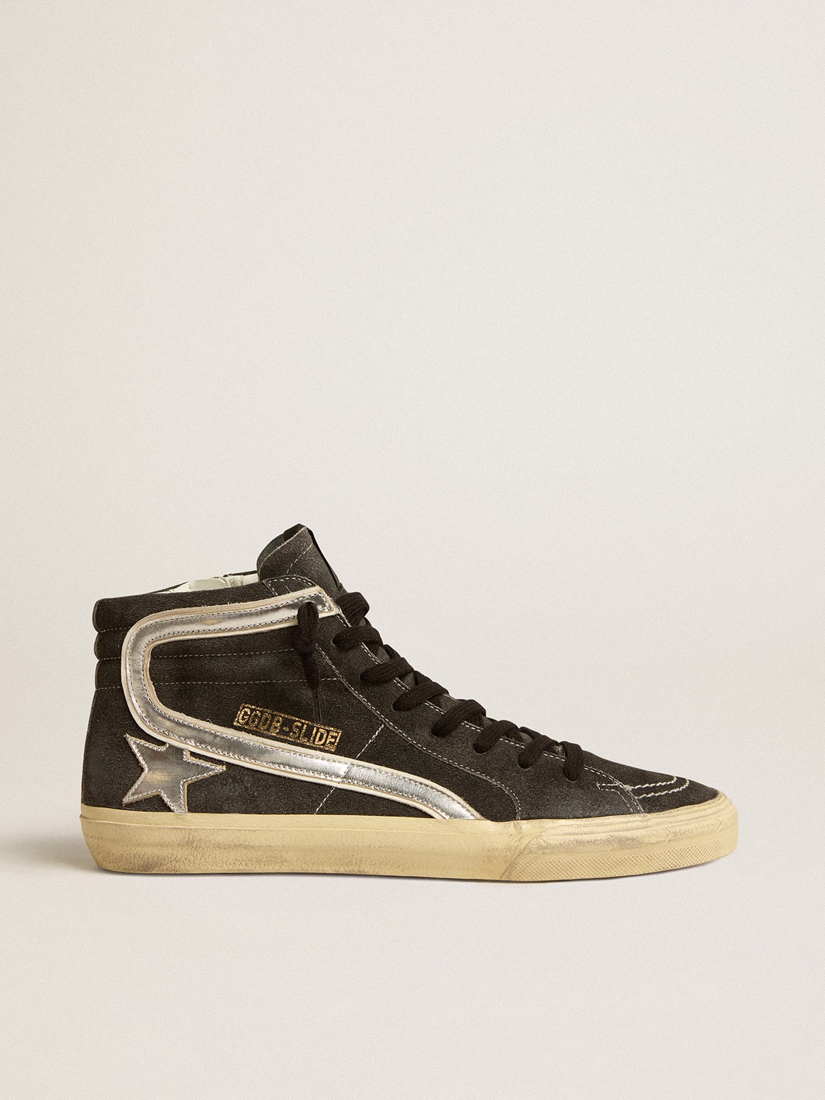Slide in black suede with silver metallic leather star and flash