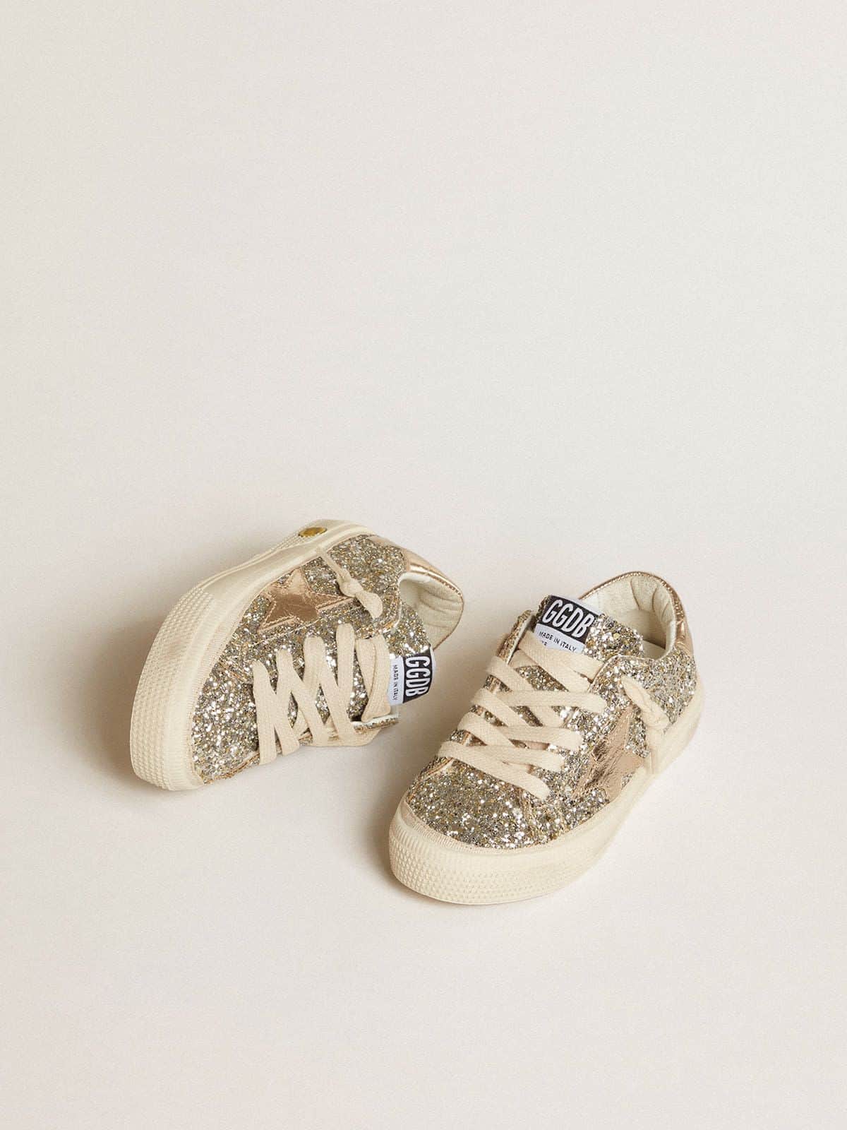 May Teen in platinum glitter with gold leather star and heel tab